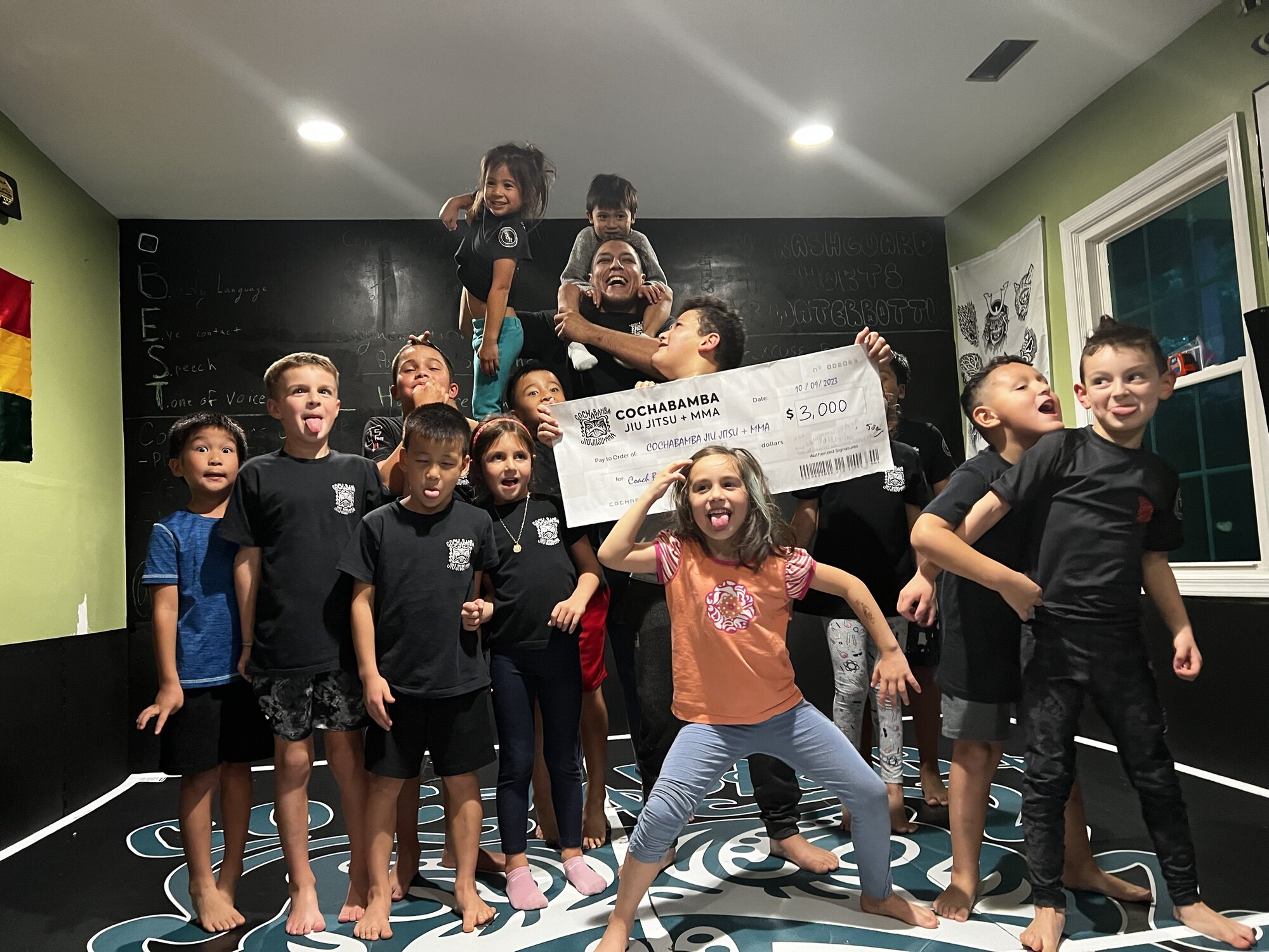 Silly faces with the big check
