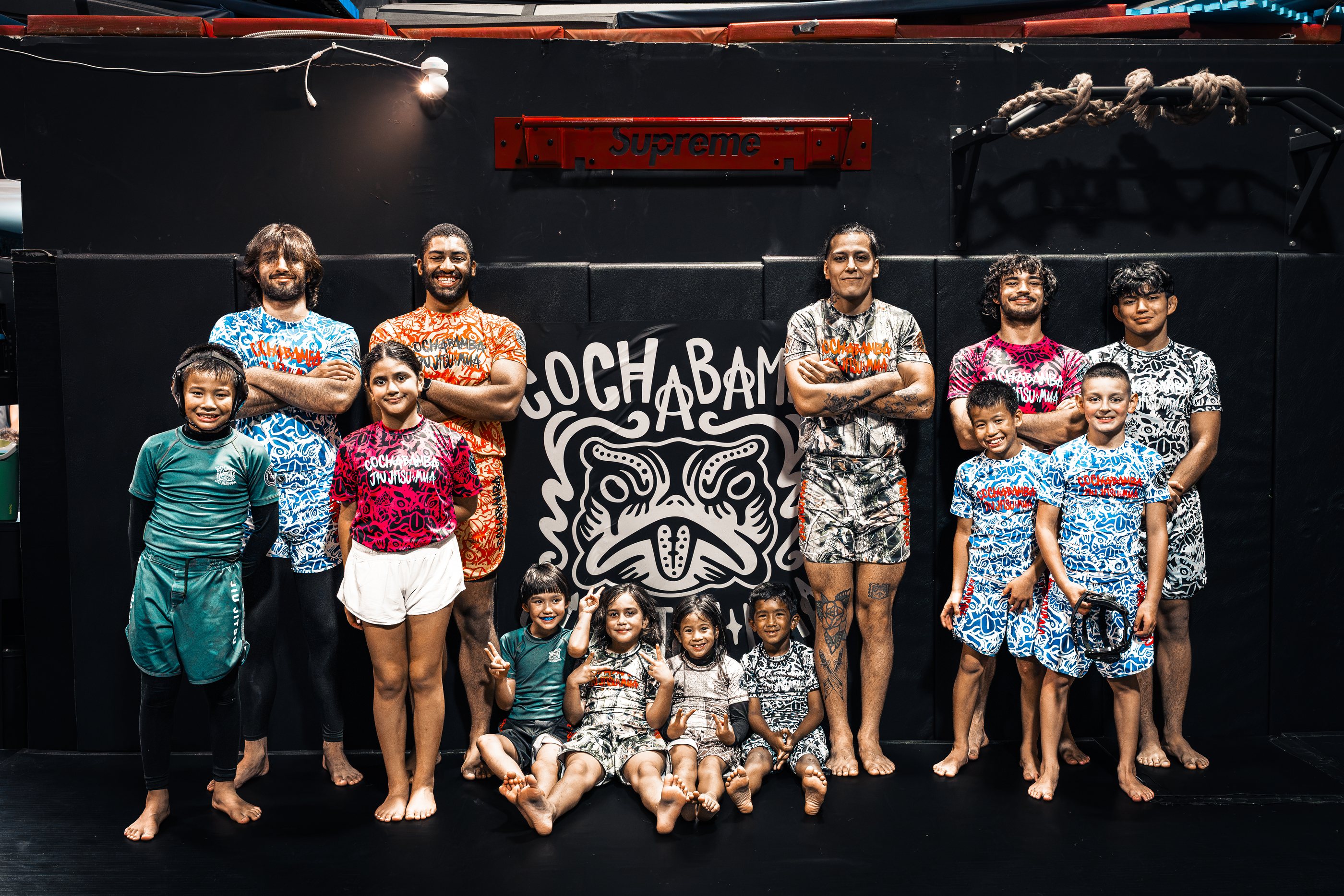 The team, kids and coaches